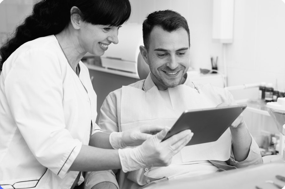 Dentist explaining a treatment plan to a patient